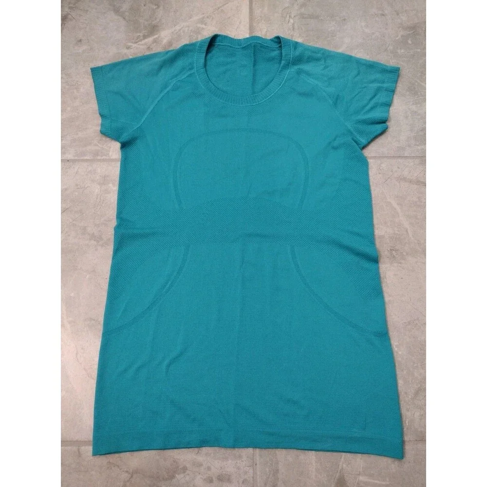 LULULEMON Women's EUC Swiftly Tech short-sleeve teal green top - size 10